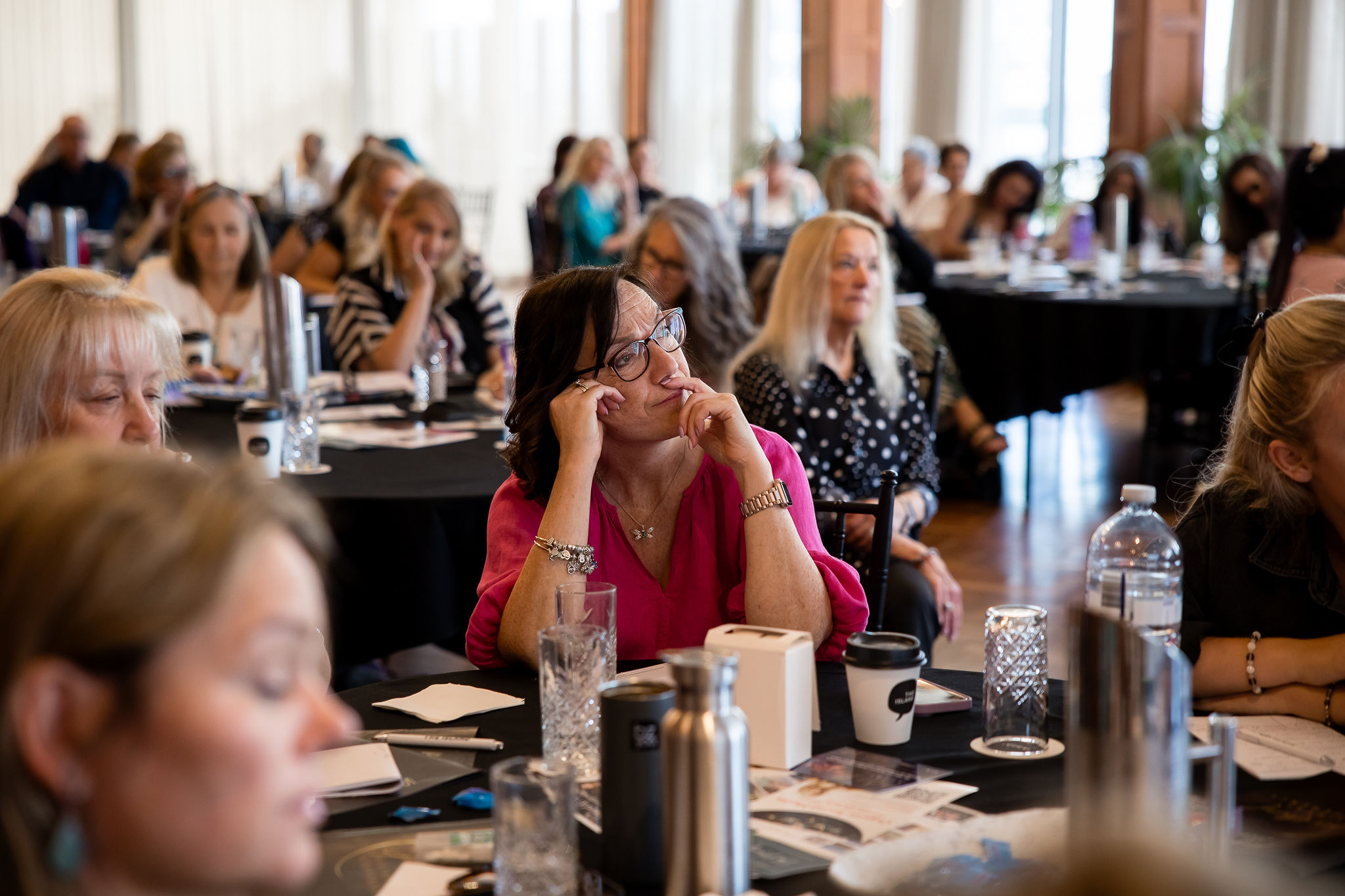 Attendees engaged at the Spiritual Business Conference