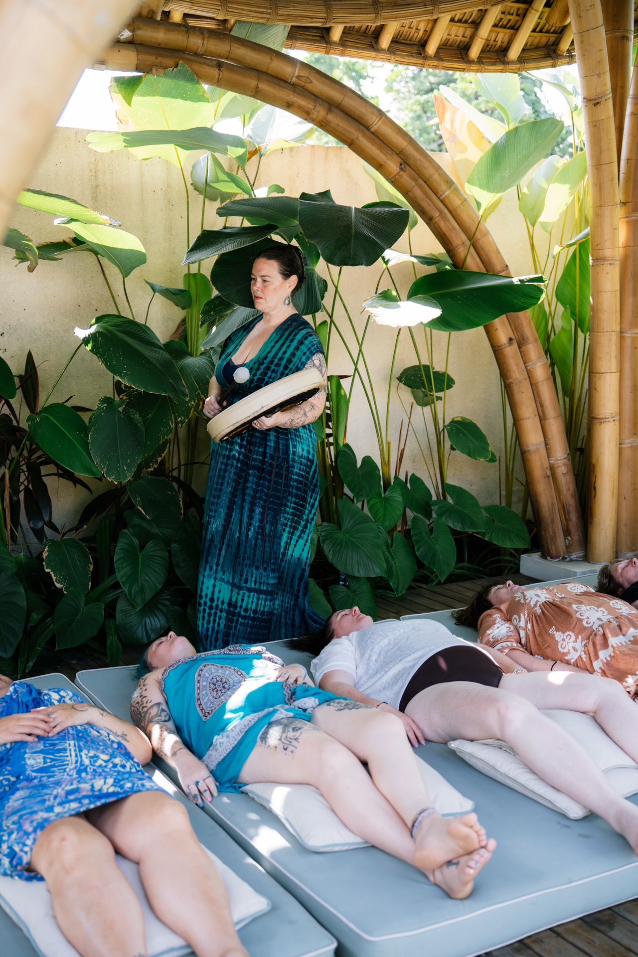 Kelly leading ceremony in bamboo pavilion, Bali