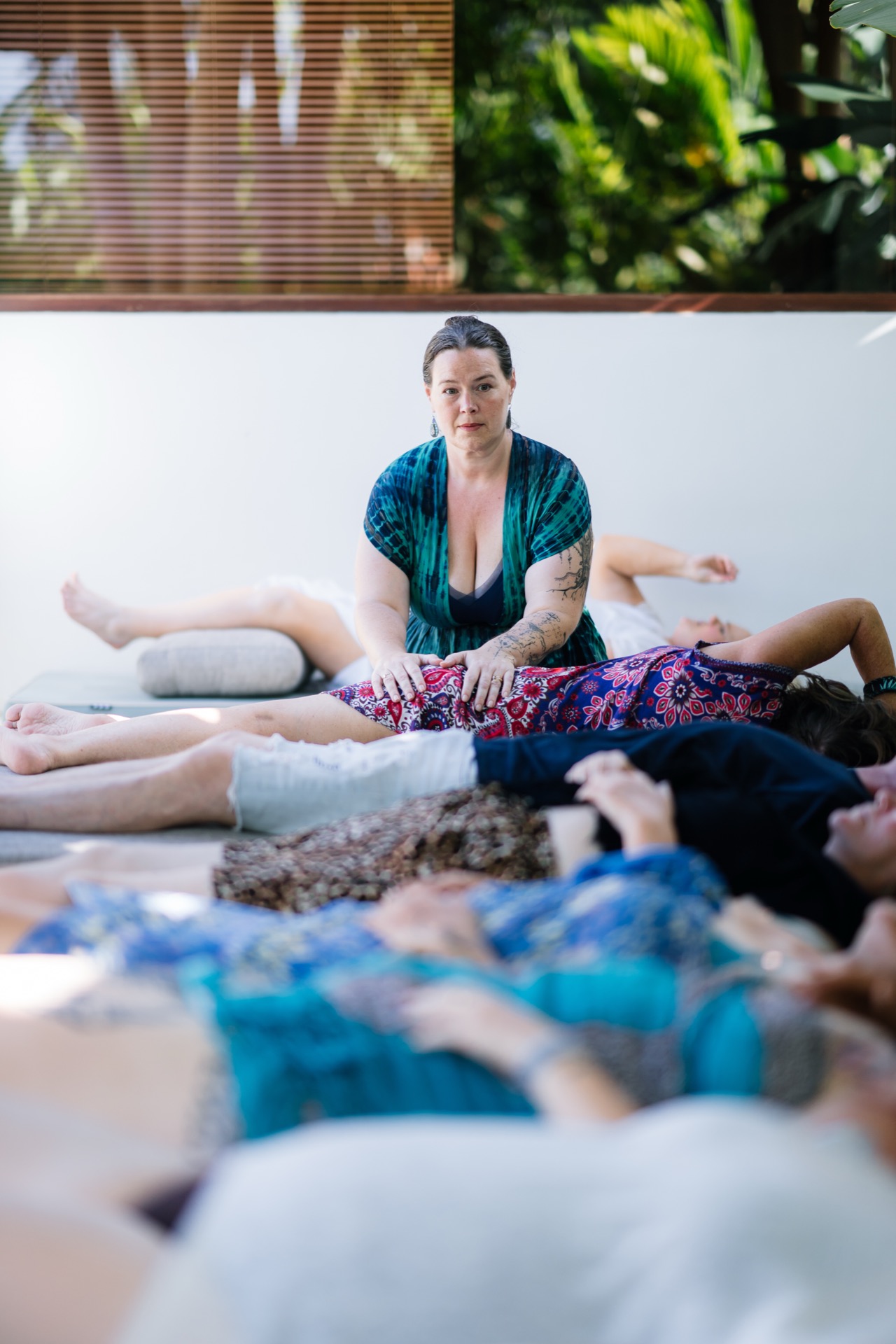 Kelly holding space during breathwork