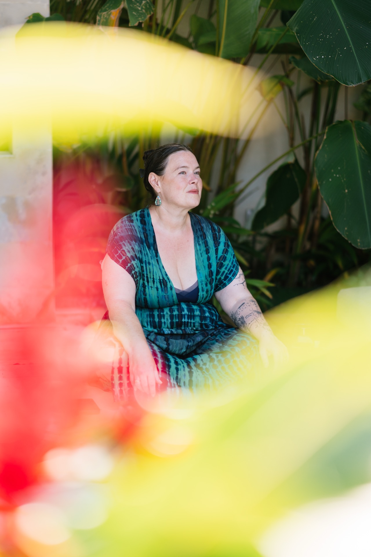 Kelly through flowers